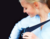 Woman locking her seat belt into place