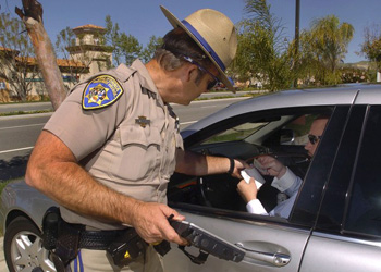 Speeding Florida driver receiving citation from law enforcement officer